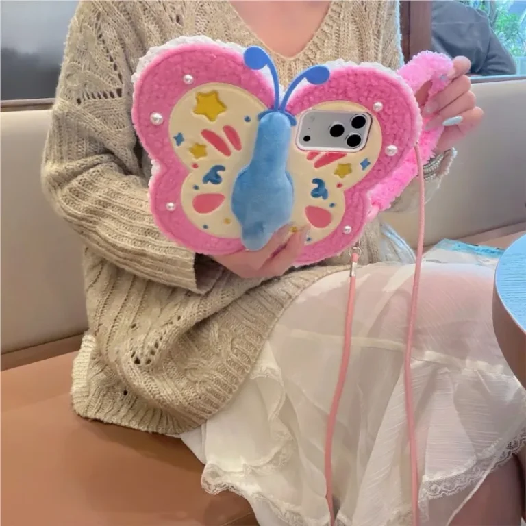 | Wholesale Price at Gaffar India Plush Butterfly Cute Cartoon Phone Case For iPhone 17 ProMAX 16 15 14 Pro Max fluffy With a handle Dopamine shockproof Cover